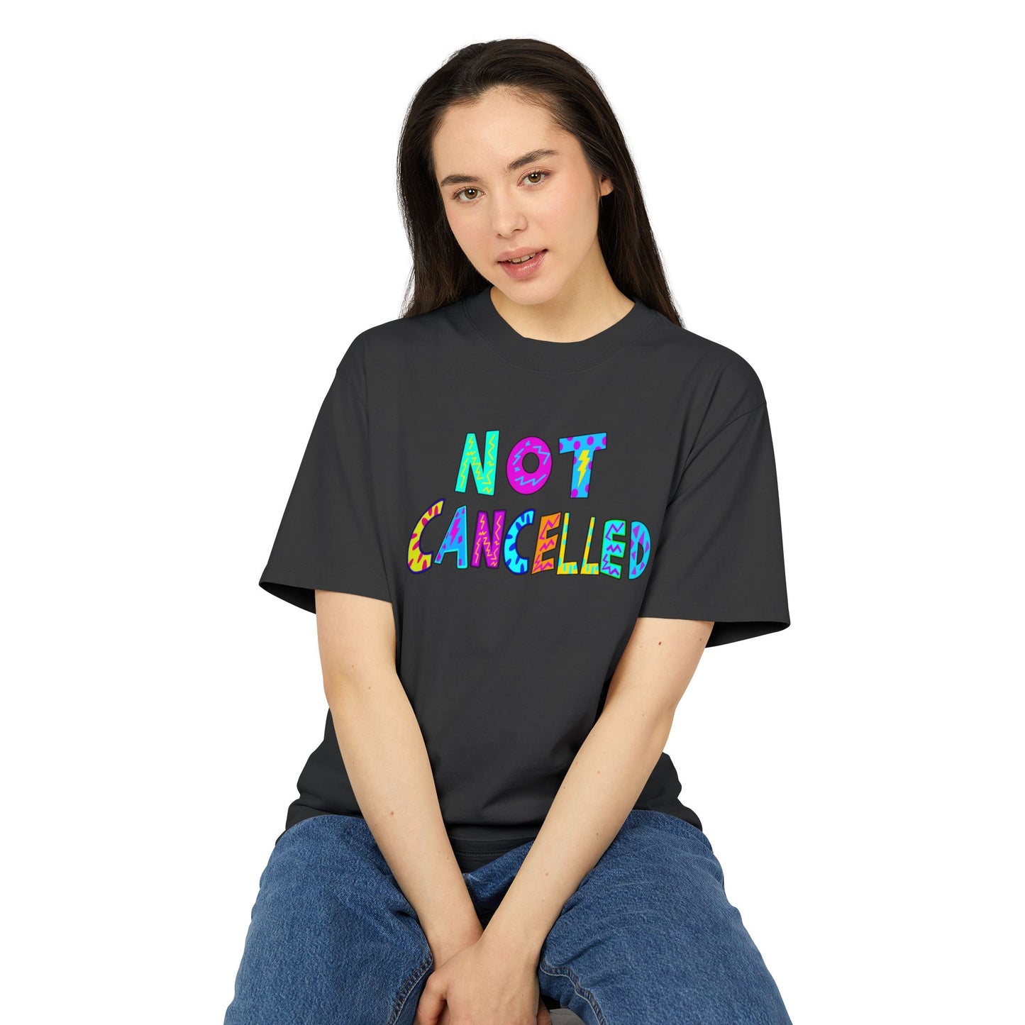 "NOT CANCELLED" Unisex Heavy Faded Tee